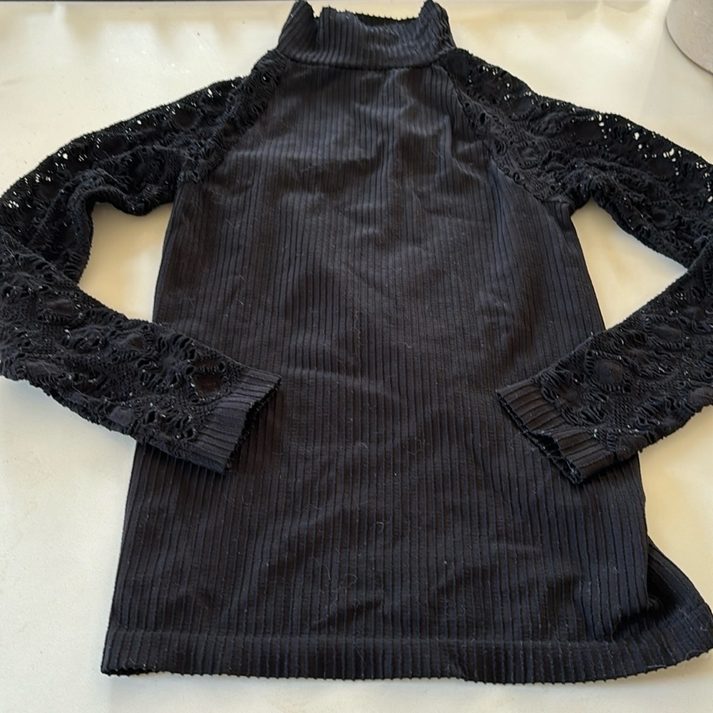 Black turtle neck with lace sleeves